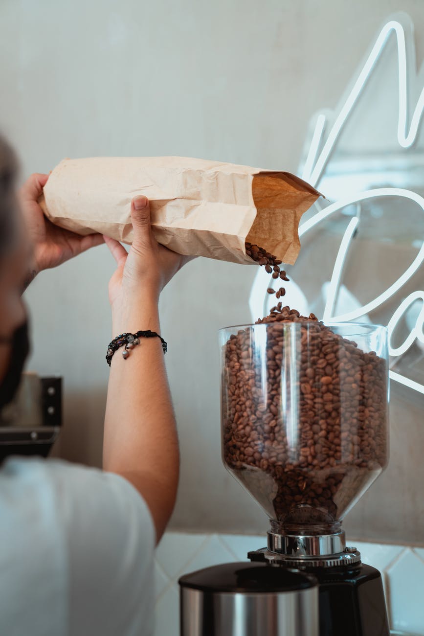 Brothers Coffee & Vending Nottingham filling coffee grinder with coffee beans